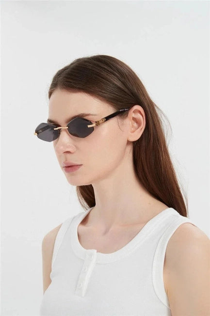 Cartier Unisex Rimless Hexagonal Black Temples Black Sunglasses