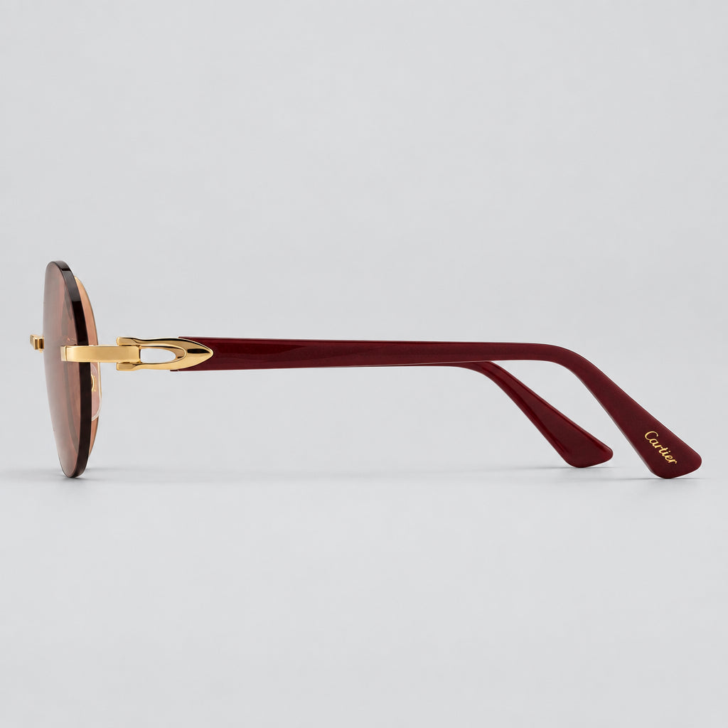 Cartier Elongated C de Motif Women Round Rimless Red Sunglasses