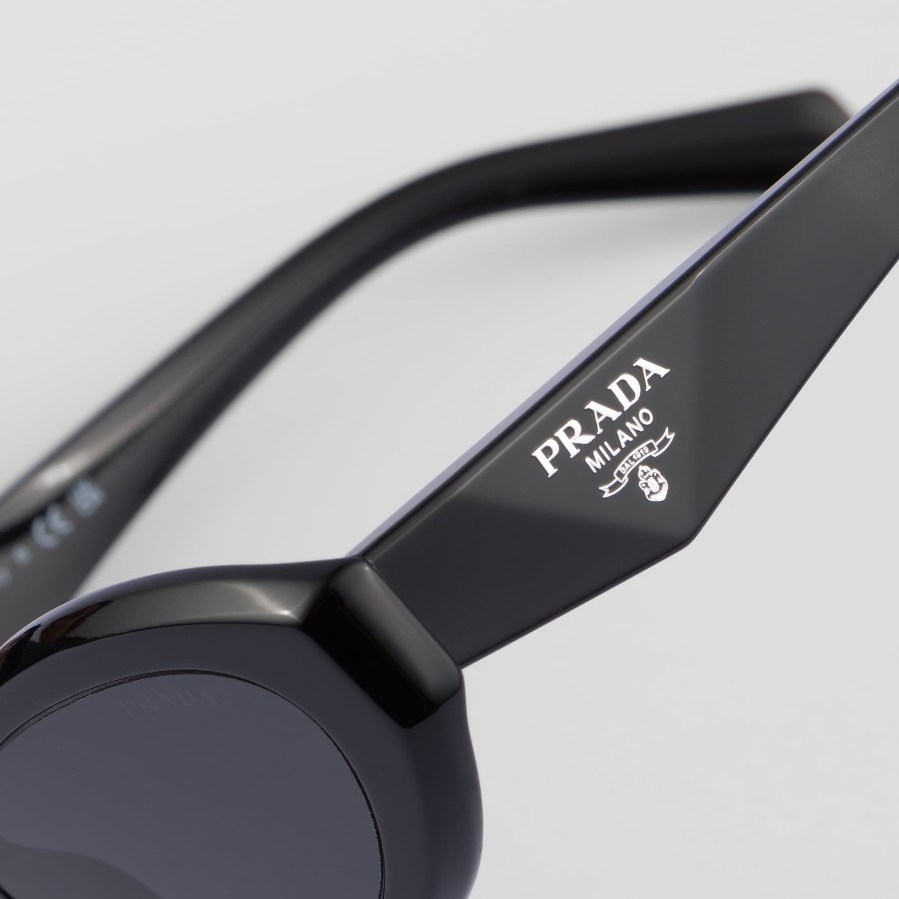 Prada Women Oval Frame Lava Black Sunglasses