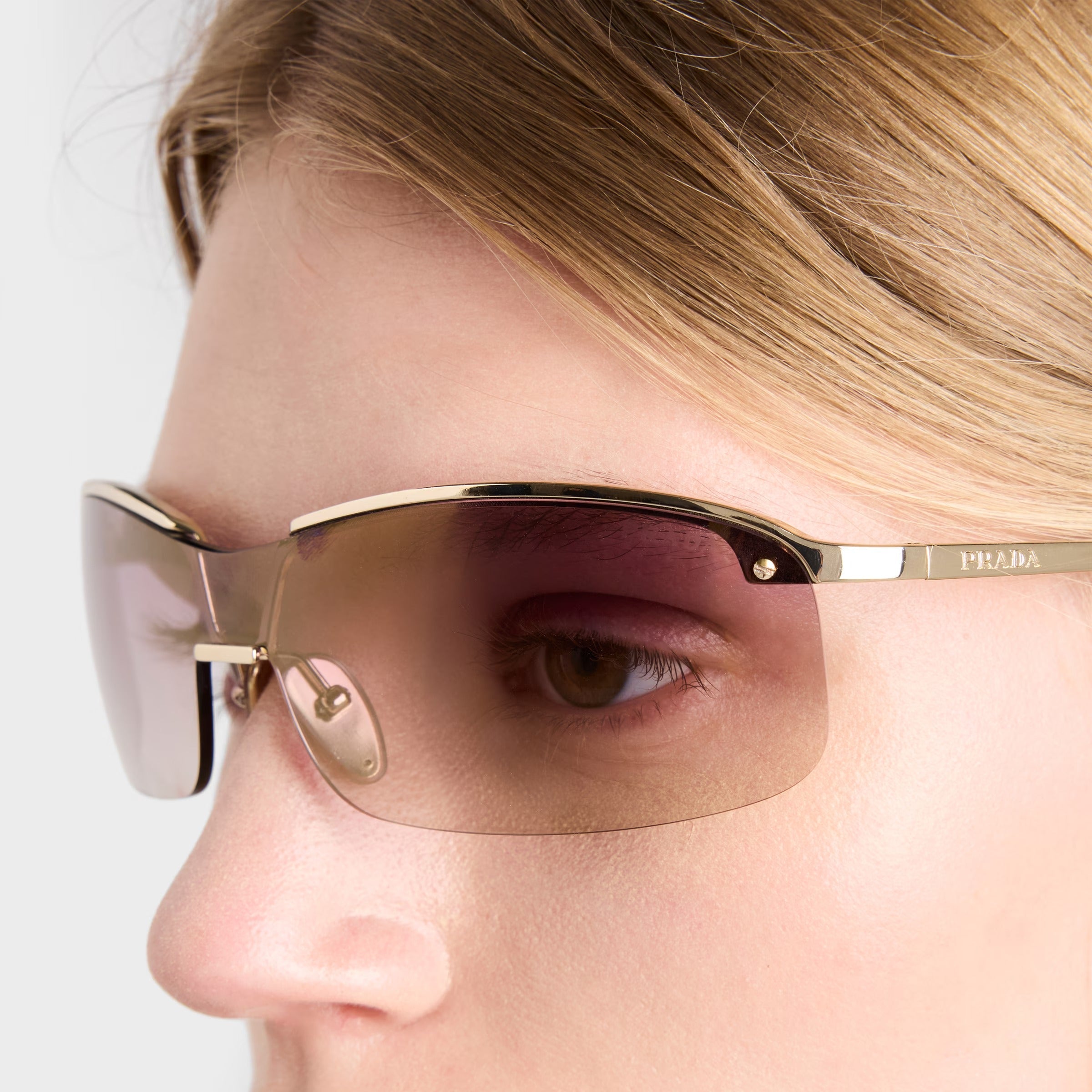 Prada Women Wraparound Frame Pale Gold Sunglasses