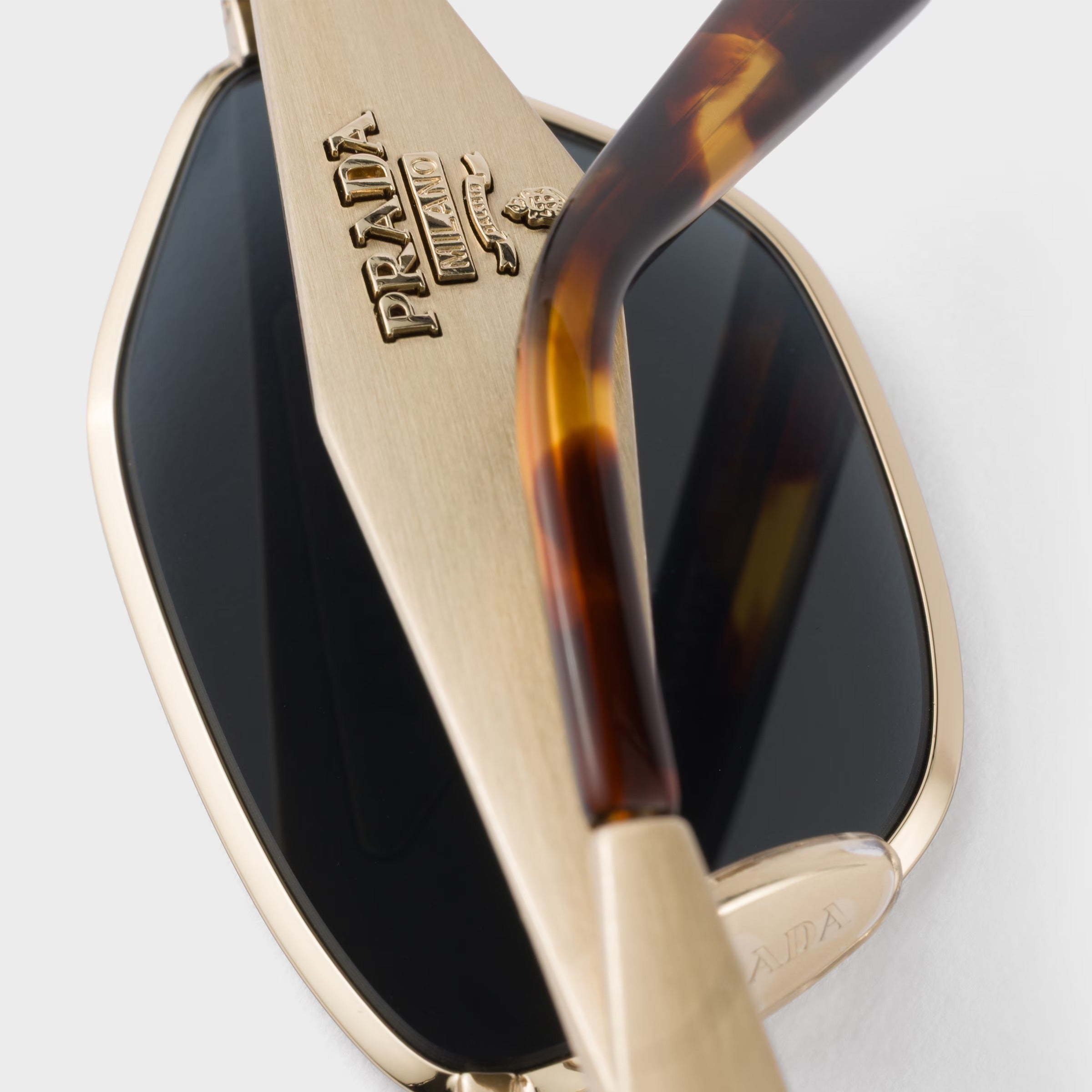 Prada Women Irregular Frame  Pale Gold Sunglasses