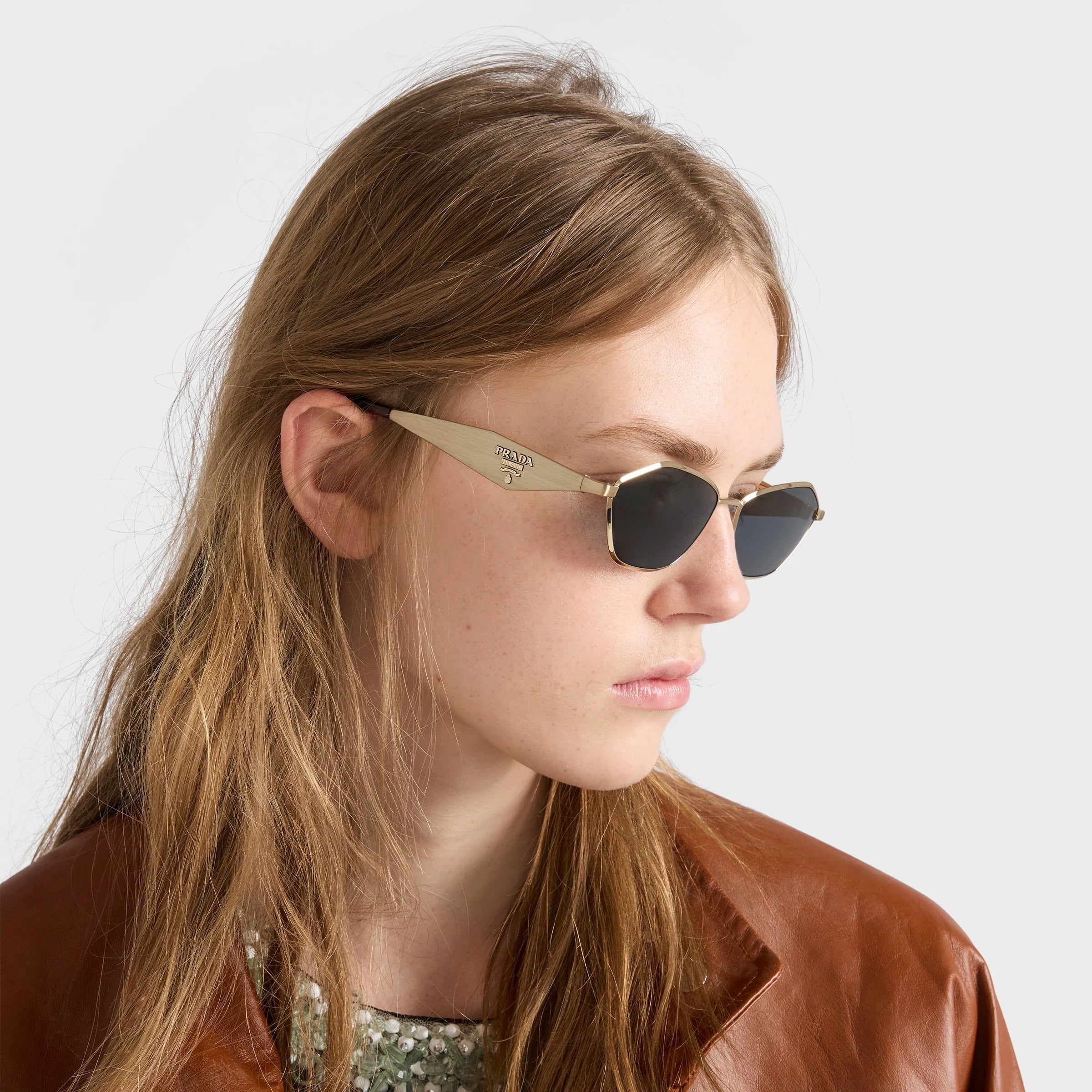 Prada Women Irregular Frame  Pale Gold Sunglasses