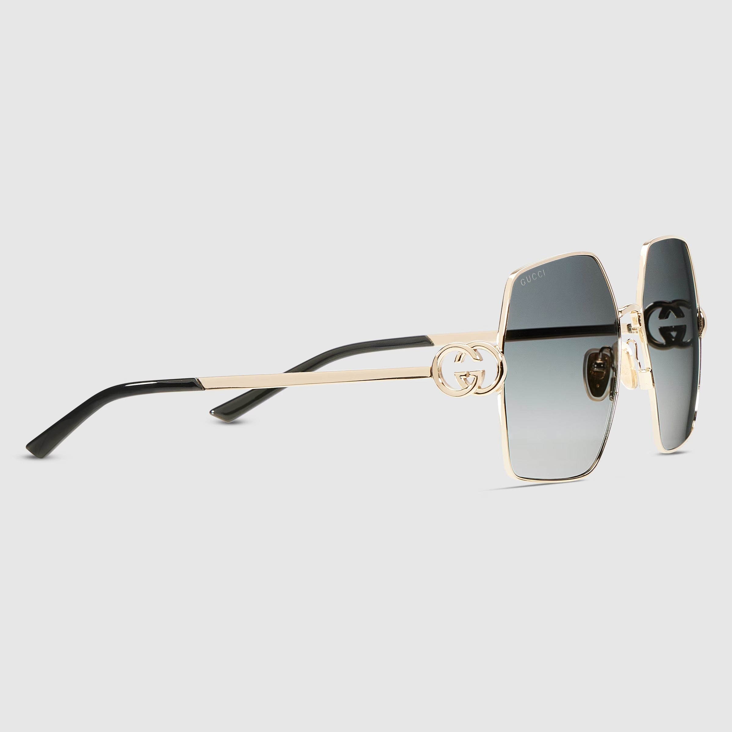 Gucci Women Oval Frame Shiny Gold Toned Sunglasses