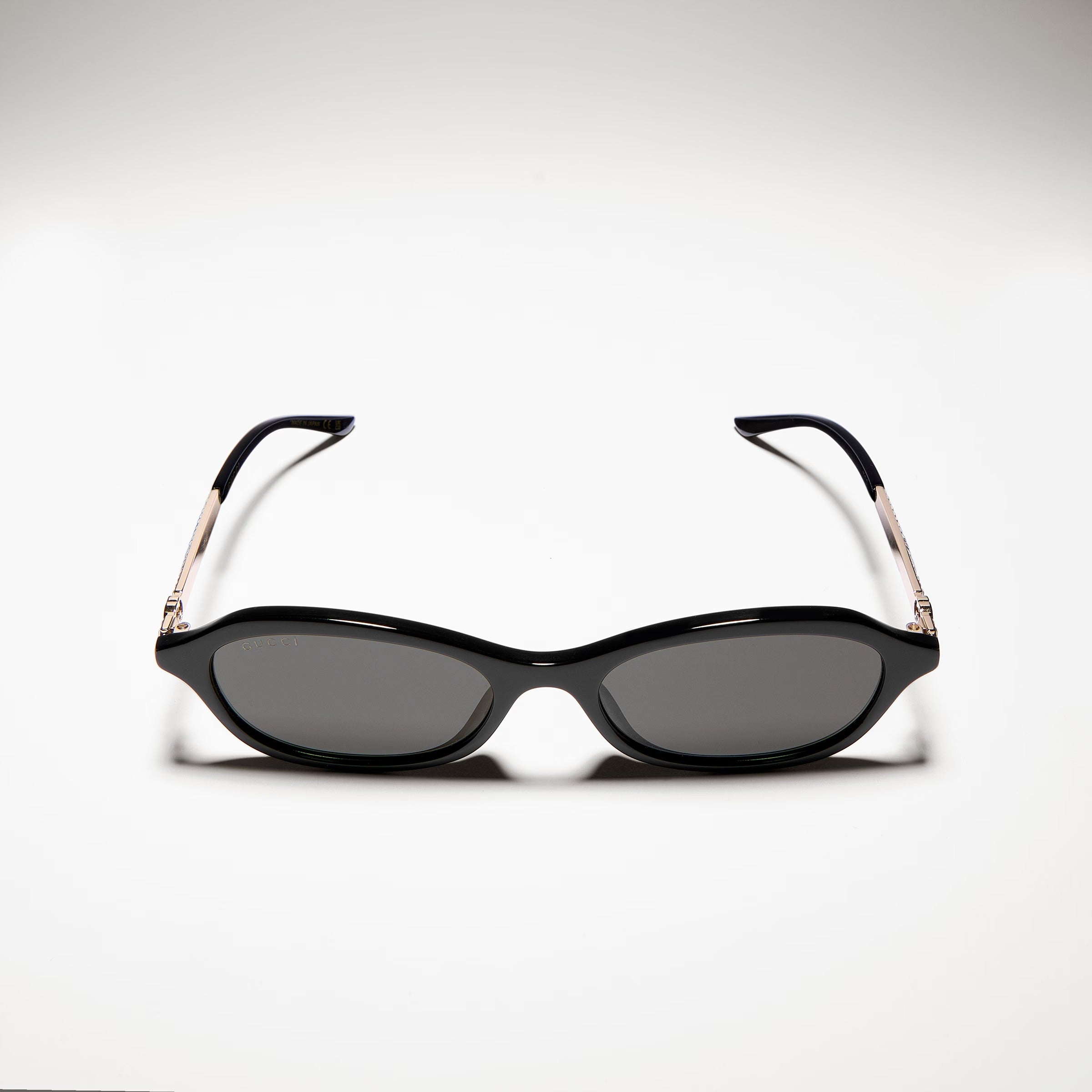 Gucci Women Oval Frame Natural Black sunglasses